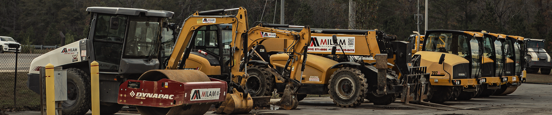 Milam Equipment Rentals yard with heavy construction equipment